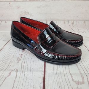 Cole Haan black with red trim Penny loafers